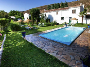Гостиница Cozy Cottage in El Padul with Swimming Pool  Падуль